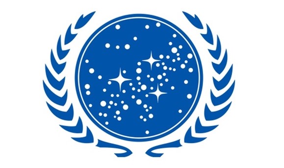 The United Federation of Planets logo features a wreath of blue leaves around a circle. There are stars inside the circle, signifying the Milky Way galaxy.