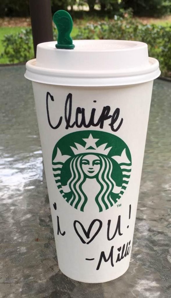A photo of a large Starbucks coffe cup. On it, the barista (presumably named Milli) wrote in Sharpie, "Claire, i [heart] you! -Milli".