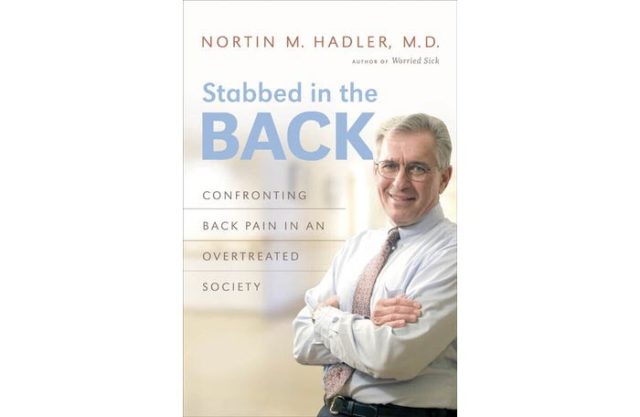 The cover image for Stabbed in the Back: Confronting Back Pain in an Overtreated Society, by Nortin M. Hadler., M.D. Hadler himself is shown leaning against something just off the right-hand margin. He looks to be in his 50s or 60s, with salt and pepper hair. He's wearing a shirt and tie, and is grinning. The background behind him is softly blurred, so it's impossible to say exactly where he is.