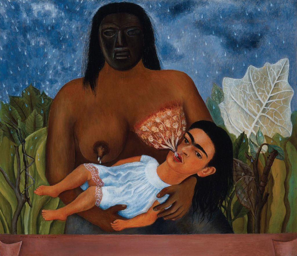 In My Nurse and I, Friday Kahlo paints herself as an infant suckling at the left breast of her wetnurse, an indigenous woman. The nurse's face is obscured by a pre-Colombian funeral mask. Her right breast drips milk onto Frida's body. The mammary glands and milk ducts of the left breast are exposed. The sky in the background is full of drops of rain, which look much like drops of milk. The rain falls onto an abundance of leafy green plants. A large white leaf is visible at the right edge of the painting.